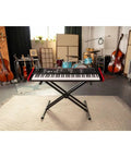 Premium 76-Key Semi-Weighted Digital Keyboard With Four Independent Sound Engines on stand in studio setting