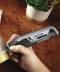 Totally Wireless Rotary Multi Tool With Super Cushioned Glove Grip And Killer 15 Piece Accessory Kit For Carving Engraving Polishing Sharpening Fast Weekend Garage Projects in use on a decorated surface.