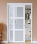 Double 25 Inch Sliding Closet Door Set For Bedroom, 48 By 80 Inch Frosted Glass Panels With 3-Lite Design installed view