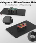 Go-To Hands-Free Soldering Station with magnetic pillars holding circuit boards on a metal surface, secure and stable.