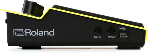 Compact Digital Percussion Pad With 22 Onboard Sounds, Kick Drum Included, SPD-1K Yellow side view showing USB port and knobs.