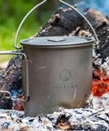 Ultra Lightweight 900ml Titanium Camping Pot And Mug With Lid And Mesh Bag Drink Directly From One Pot 134g on campfire