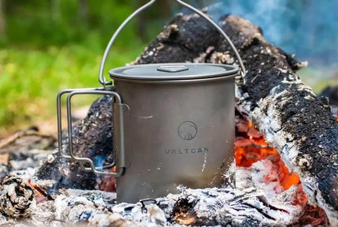 Ultra Lightweight 900ml Titanium Camping Pot And Mug With Lid And Mesh Bag Drink Directly From One Pot 134g on campfire