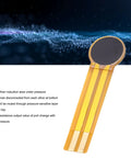 FLEXMAN thin-film pressure sensor with circular top disk on flexible yellow film and gold conductive traces