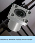 Heavy Duty Square Flange Linear Ball Bearing, ID 12mm OD 21mm, Sae 52100 Carbon Steel With Quad Ball Setup close-up view.