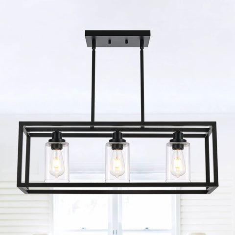 3 Light Linear Kitchen Island Chandelier Dope Matte Black With Rectangular Clear Glass Shades over white background.