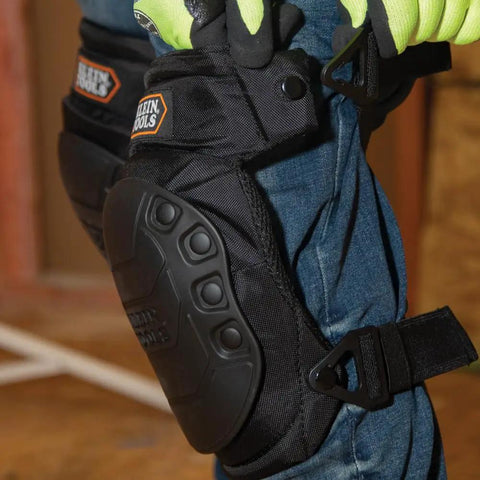 All Day Comfort Hinged Gel Knee Pads With Slip Resistant Rubber Caps, Quick Release Clips And Adjustable Straps on worker's knees