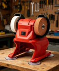 Badass Performance Compact 21V Cordless Bench Grinder with coarse and fine wheels on a workbench for quick metal and wood tasks.