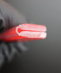 Close-up of 4 Pack 12 Inch Transparent Acrylic Piano Hinges with Self Adhesive Backing No Glue Required, showing detail of hinge edge.