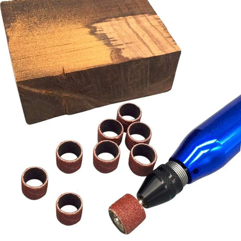 Heavy Duty Sander Drum Mandrel With Ten Badass 80 Grit Sanding Bands For Multi Material Grinding and Nail Drill Slick Rotary Accessory Set showing sanding bands and wood.