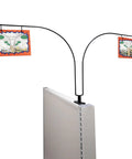 Game Changing Curved Gondola Shelf Double Side Magnetic Base Sign Holder Rack displaying two signs in a retail aisle.