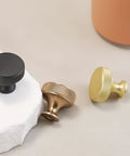10 Pack Brushed Brass Kitchen Cabinet Knobs With Knurled Texture Gold Drawer Knobs displayed with a bronze and black knob set