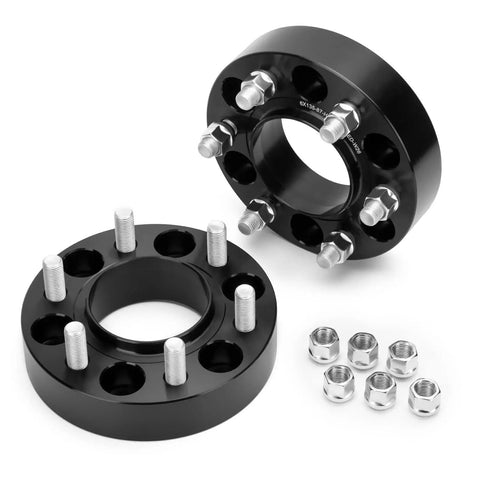 Precision Machined 4 Piece Forged Wheel Spacers 1.5 Inch Thick 6x5.5 Bolt Pattern 77.8mm Hub Bore M14x1.5 Studs view showing black finish and hardware.