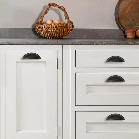 Matte Black Cabinet Cup Pulls Two And A Half Inch Center To Center Pack Of 10 installed on white kitchen cabinets