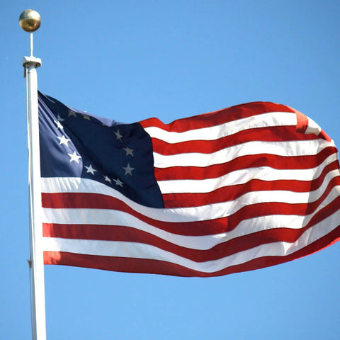 All American Betsy Ross Flag 3x5 Ft Outdoor Embroidered 13 Star Flag Double Sided Colonial Banner on flagpole against the sky