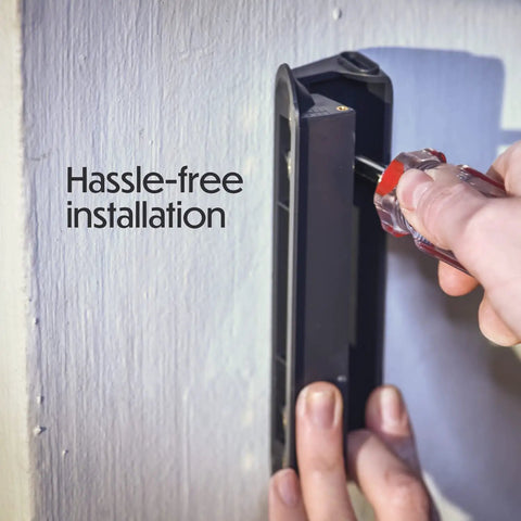 Person installing Horizontal Adjustable Mount For Google Nest Doorbell Battery with screwdriver, wall mount visible