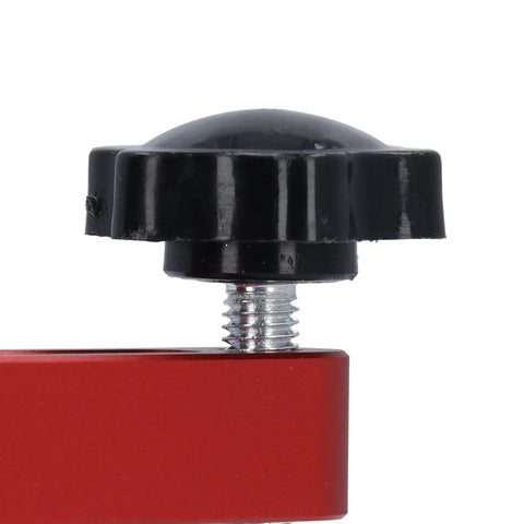 Close-up of Two Piece Bench Dog Clamp Set Beefy Aluminum Alloy Hold Down Clamps, red clamp bar and black knob