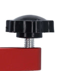 Close-up of a Two Pack Aluminum Alloy Bench Dog Clamps Hold Down Clamps for Woodworking with black knob and red base