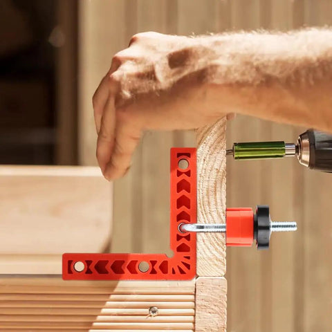 Using Sixteen Piece Right Angle Clamp Set for Woodworking with 90 Degree Positioning Squares on wooden frame.