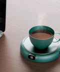 Electric Coffee Mug Warmer Keeps Your Daily Brew Nice And Toasty All Day Long A Total Desk Game Changer Perfect For Hot Cocoa Tea Coffee Soup And Ceramic Mugs with steaming cup on desk.
