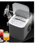 No Fuss Portable Countertop Ice Maker With Sturdy Carry Handle And Easy Self Cleaning Cycle Fast Freeze Compact Ice Machine creating ice cubes.