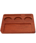Solid Wood Espresso Tamper Station With Silicone Mat And Seven Piece Barista Gear Featuring Spring Loaded Hand Tamper Distribution Tool Dosing Ring Stainless Puck Disc And Detail Brush For Dialing In Perfect Home Brews Every Time, showing polished wood station with compartments.