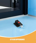 Spring Loaded Door Latch Push Button Cabinet Hardware Kit Black ABS on blue surface with corner view.