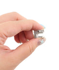 Heavy Duty Zinc Alloy Furniture Cam Locks 50 Pack Cam Bolt Nut Connectors 15 X 12 Mm Silver in hand, showing design and material.