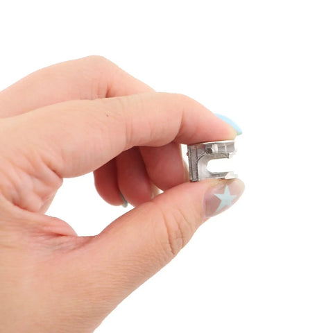 Heavy Duty Zinc Alloy Furniture Cam Locks 50 Pack Cam Bolt Nut Connectors 15 X 12 Mm Silver in hand, showing design and material.