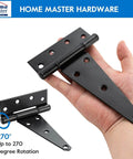 Hand holding 8 Inch T Strap Heavy Duty Shed Door Hinges Black Tee Hinge for Wooden Fences, 270 degree rotation