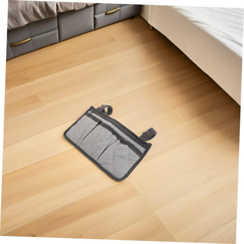 Must Have Bedside Organizer Bag With Four Pockets And Cup Holder on wooden floor, gray with dark gray accents