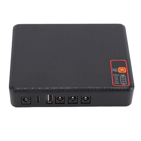 Rock Solid Compact Ups Battery Backup With 12000Mah, black, showing ports for 12V, 9V, 5V connections, designed for routers.