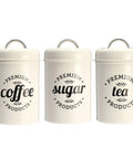 Heavy Duty Metal Coffee Canister Set Of Three Wide Mouth Kitchen Storage Jars For Beans Tea Sugar And Nuts. White containers with labels.