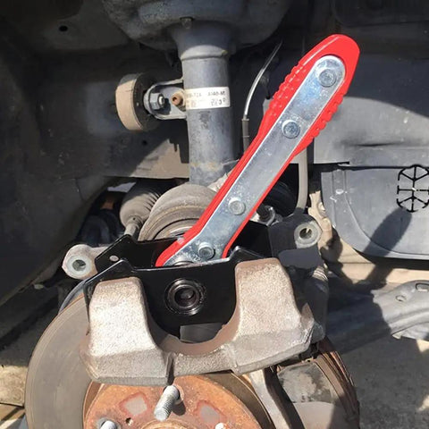 Installed 4 In 1 Universal Disc Brake Caliper Tool With 360 Degree Piston Spreaders on a car brake system