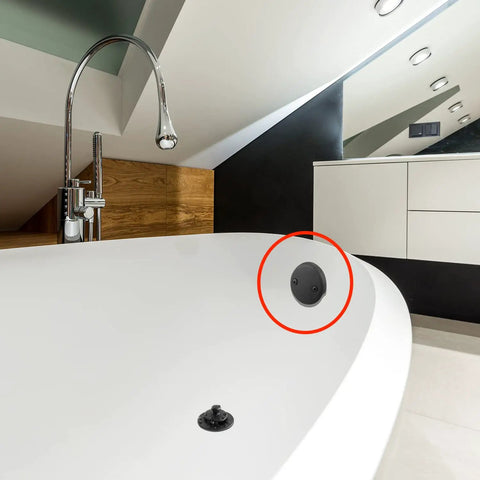 Dual Hole Bathtub Drain Overflow Cover Plate With Two Matching Screws Easy Peasy Installation Hella Solid Zinc Construction Drop Dead Sleek Matte Black Finish in modern bathroom.