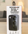 6.5 Foot Extension Cord With Three AC Outlets Two USB Type C Ports One USB Port Thermal Fuse Protection Surge Guard Power Strip Badass Performance For Home Office Daily Grind Black product packaging displayed on a wooden surface.