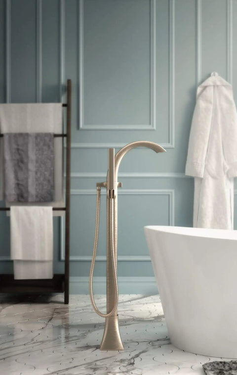 Freestanding Tub Filler Kit With Single Riser For Floor Joist Concrete Mounting in bathroom beside white tub