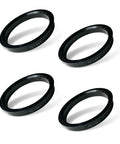4 Pack Wheel Hub Centric Rings 73 1 Outer To 64 1 Inner Diameter Plastic Bore Adapter Spacers Black shown from an angled view.