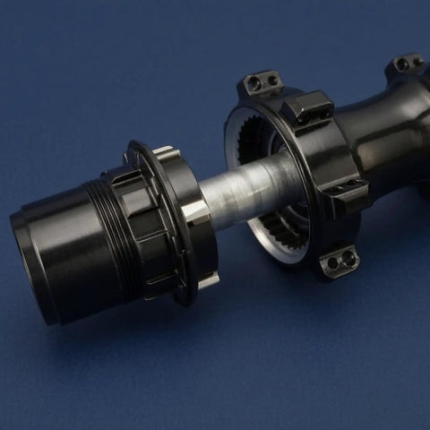 Driver Hub Body For XD XDR 11 12 Speed Cassettes Aluminum Alloy Wheel Hub Part, black close-up on blue background