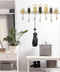 Tough As Nails Nordic Wall Hooks With Zero Drill Install for coat and key storage, sleek design, heavy duty iron, and umbrella holder.