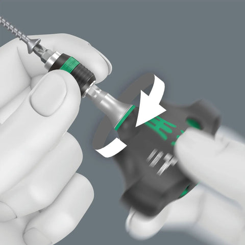 Hands using Kraftform Kompakt 400 RA 17-Piece T-Handle Ratcheting Bit Set With Built-In Ratchet And Reversible Drive