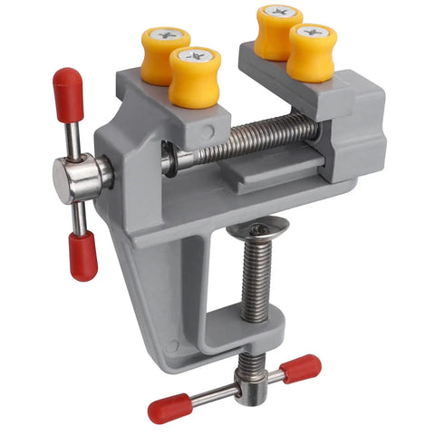 Rock Steady Mini Bench Vise Snags Loose Pieces For Jewelry Woodcarving And Watch Repair Ace Portable Table Vice side view with yellow and red knobs.
