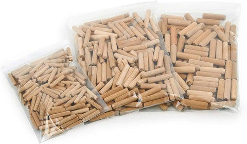 Top Shelf Kiln Dried Birch Dowel Pins in three bags, assorted sizes for furniture repair and workshop builds.