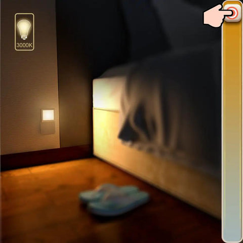 Plug In Dimmable LED Night Light with Auto Dusk to Dawn Sensor Soft Warm White next to bed in bedroom showing brightness adjustment.