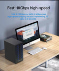 Hella Fast 8 Bay Tool Free Hot Swap Drive Enclosure With Smart Cooling Fan on desk, supporting 2.5 and 3.5 SATA drives via USB C.