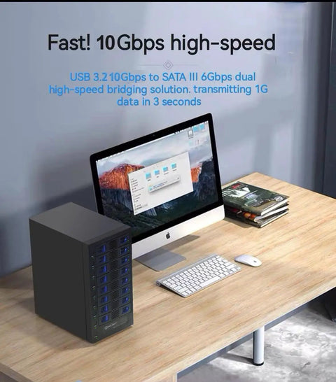 Hella Fast 8 Bay Tool Free Hot Swap Drive Enclosure With Smart Cooling Fan on desk, supporting 2.5 and 3.5 SATA drives via USB C.