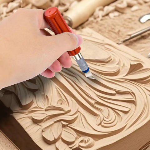 Hand using 13 Piece Precision Craft Knife Set with Interchangeable Blades and Ergonomic Handles for detailed wood carving.
