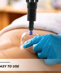 Universal Replacement Manual Cupping Pump With Ergonomic Grip for Vacuum Cups in use on back with gloved hand.