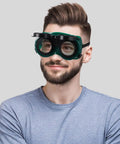 Top Shelf Welding Goggles Four Pack Anti Glare Safety Glasses With Comfy Adjustable Fit Rock Solid Build shown on a man.