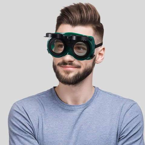 Top Shelf Welding Goggles Four Pack Anti Glare Safety Glasses With Comfy Adjustable Fit Rock Solid Build shown on a man.
